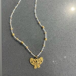 Elegant Gold and White Beaded Necklace